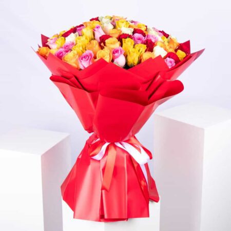 Stunning mix of 100 roses in full bloom, featuring vibrant colors and wrapped in red eco-friendly paper. Available for delivery