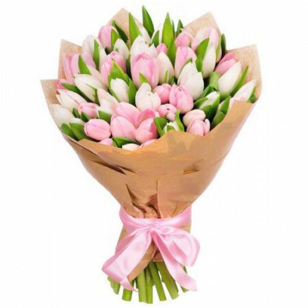 bouquet of pink and white tulips wrapped in brown paper with a pink bow