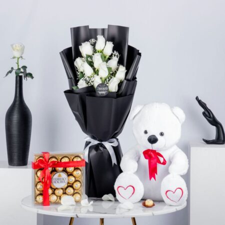 White rose bouquet with white reddy bear and 24 Pc chocolates