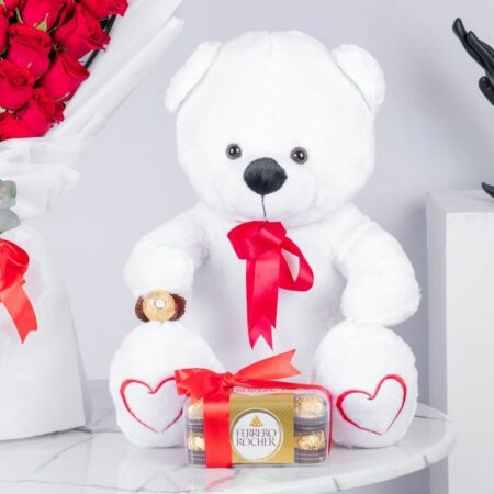 Red Roses arranged in Heart Shape with Chocolates and teddy bear