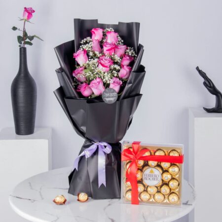 Bouquet of pink roses with chocolates