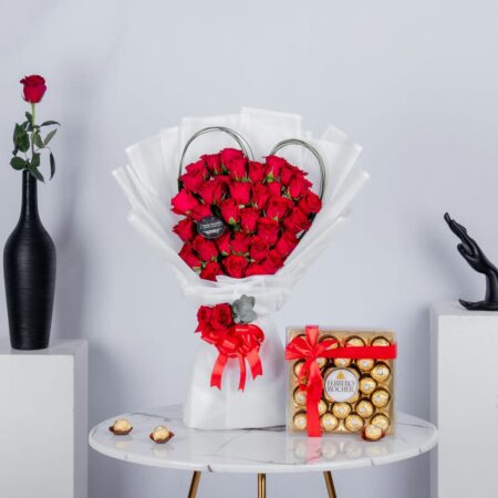 Red Roses arranged in Heart Shape with Chocolates