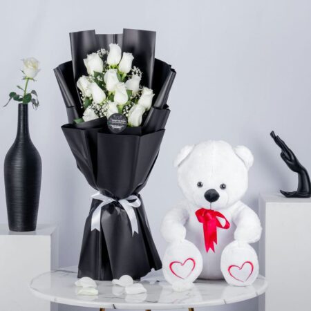 White rose bouquet with white teddy bear