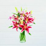 Smell Of Divine – lilies in a vase