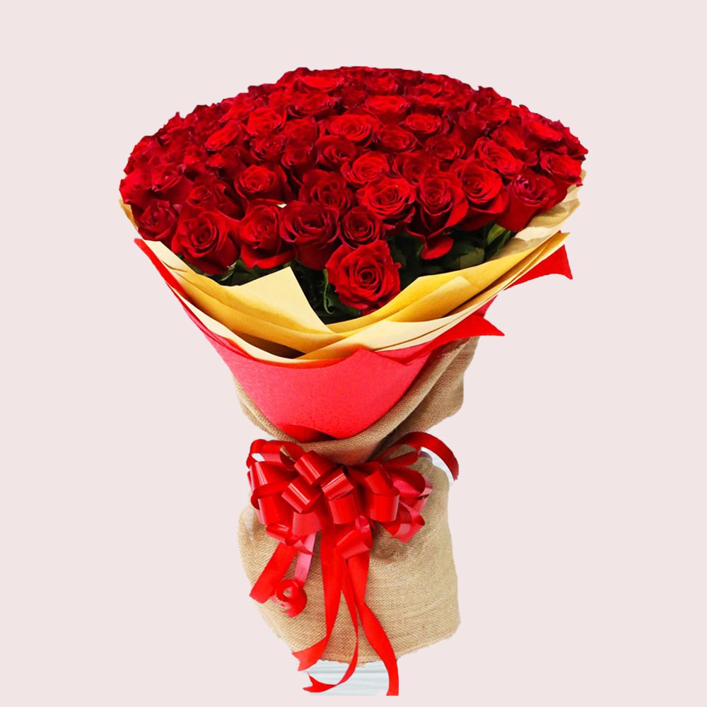 50 Red Roses in nice wrapping with red ribbon