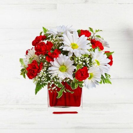 3pcs Chrysanthemum and 9 Carnations with fillers arranged in a glass vase