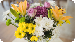 Close up view of mixed flowers in a classic arrangement